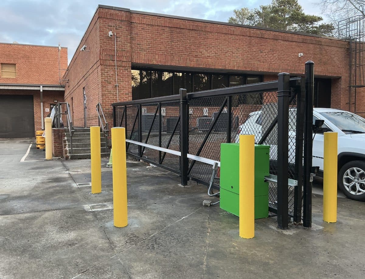 Black chain link cantilever gate with operator in Atlanta Georgia