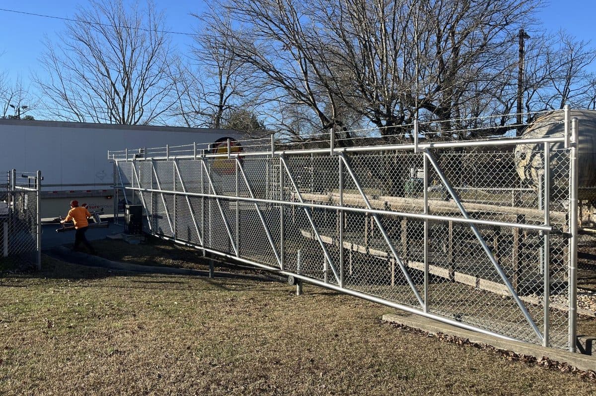 Chain link cantilever gate installation in Atlanta Georgia