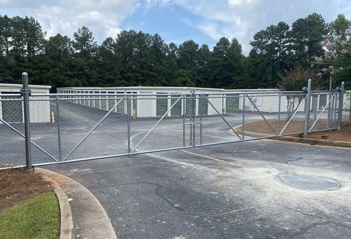 Chain link double drive gate with walk gate in Georgia
