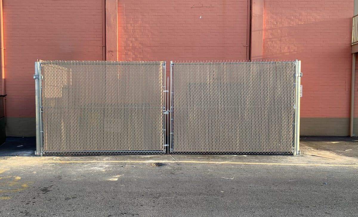 Chain link dumpster gate repair with privacy slats, Atlanta, GA