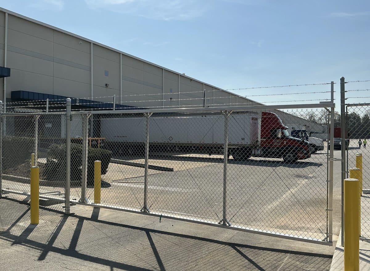 Commercial chain link slide gate at warehouse in Atlanta Georgia
