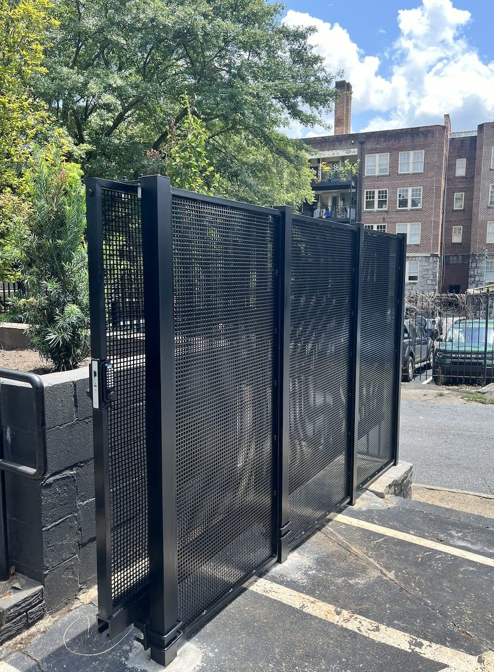 Custom black mesh panel fence installed at commercial property in Georgia